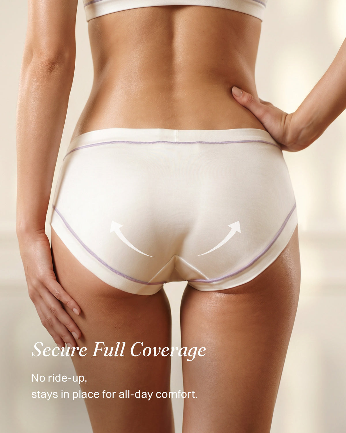 Back view of white silk briefs with lavender contrast stitching and full coverage